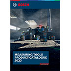 Bosch Professional measuring tools catalog on a work surface, showcasing various tools.