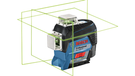 A Bosch Professional laser level in blue, with green laser lines in a spatial grid.